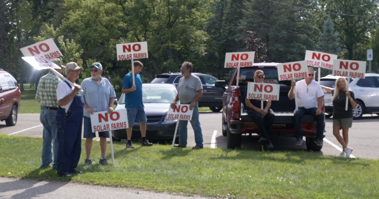 Shiawassee County residents protesting further development of solar farms in the county