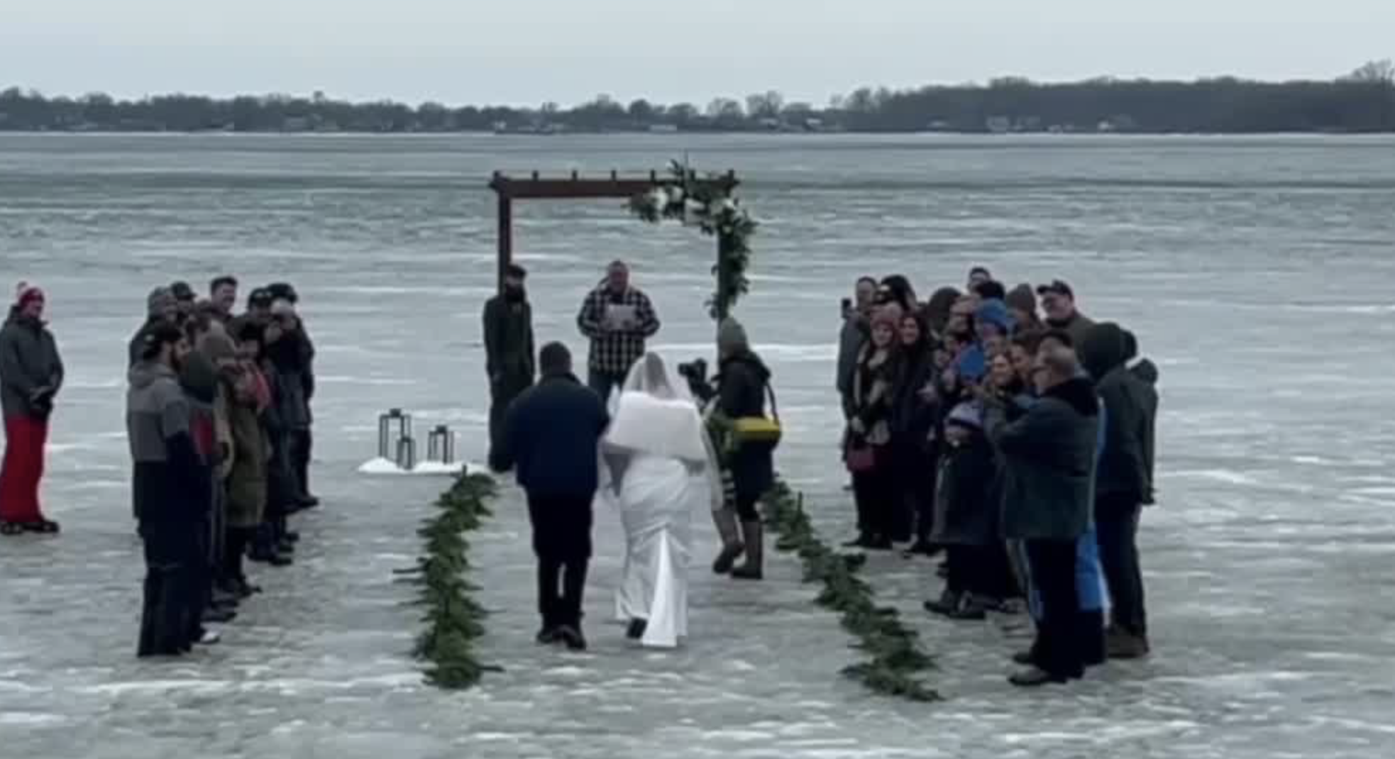 Couple getting married on Lake Erie Ice