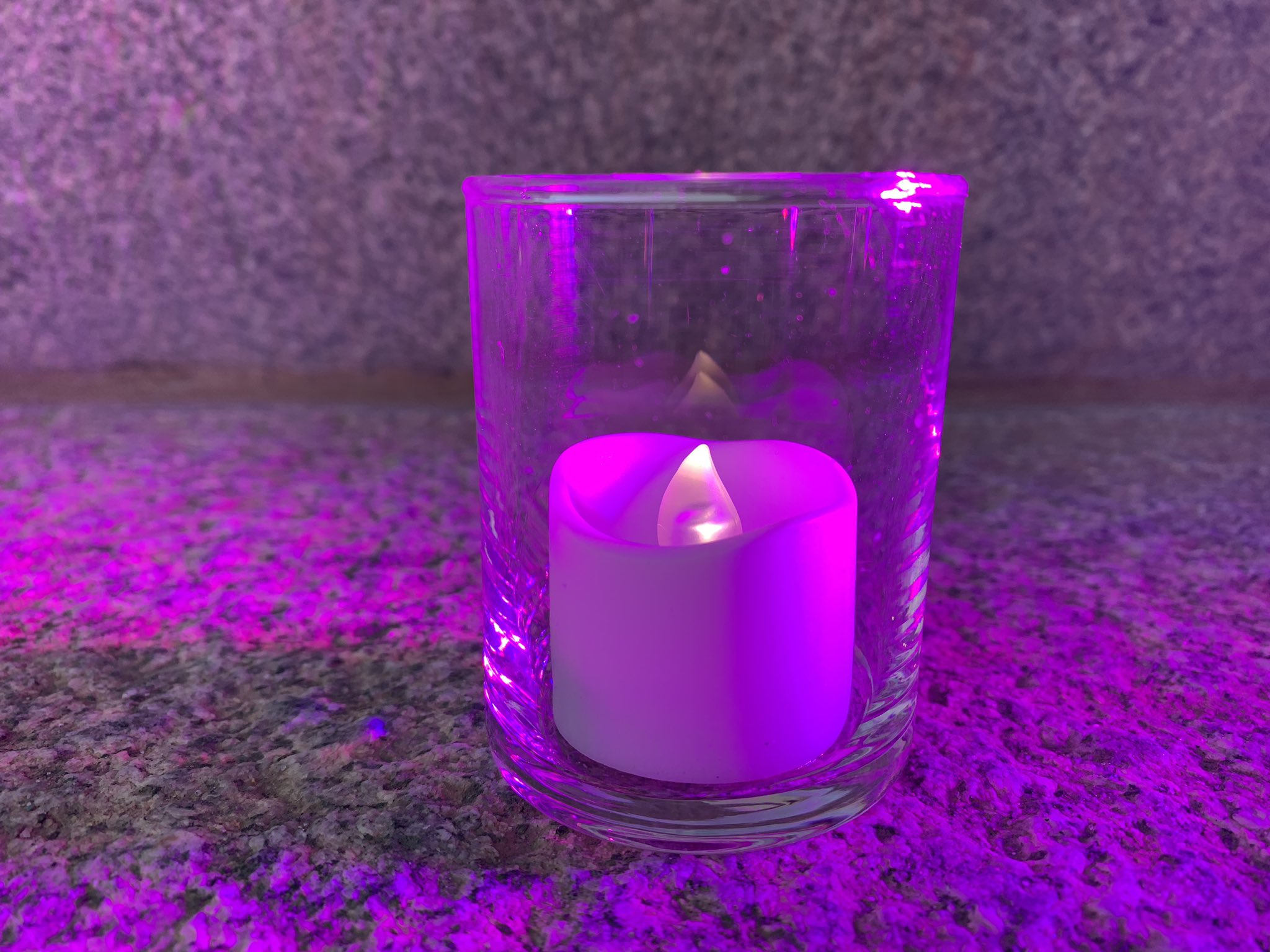 magenta candle covid one year.jpeg