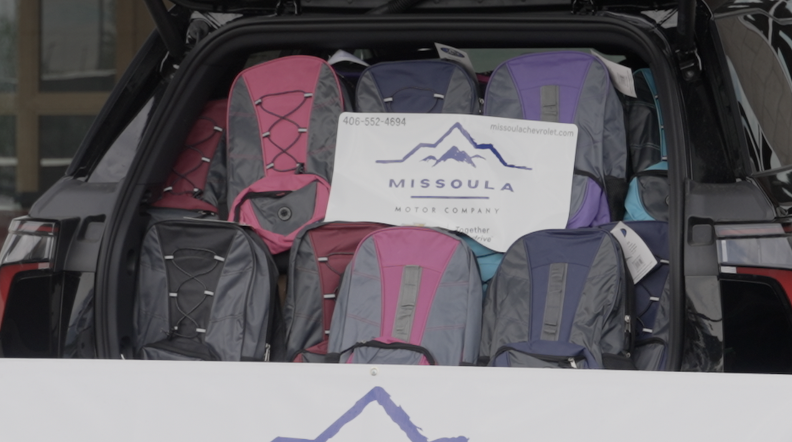 United Way of Missoula and Missoula Chevrolet give out free backpacks 
