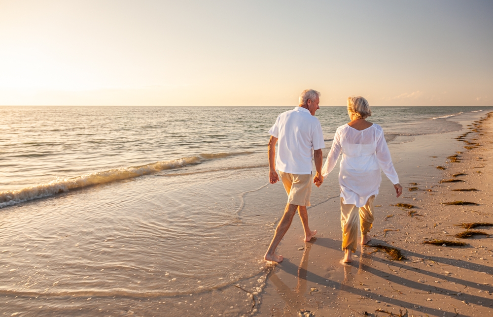 A couple walking on the beach
