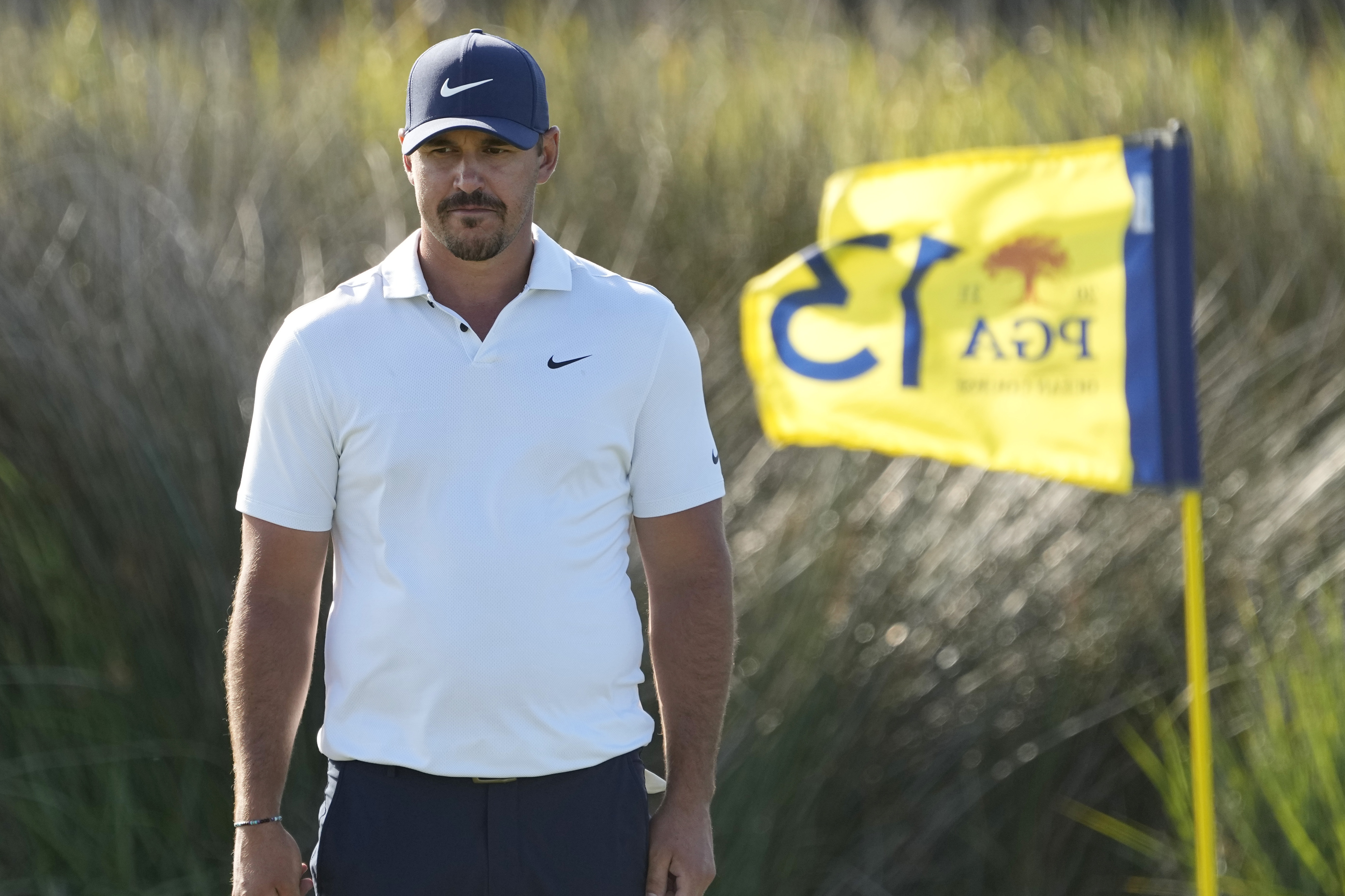 Brooks Koepka waits to putt on 13th hole during second round of 2021 PGA Championship