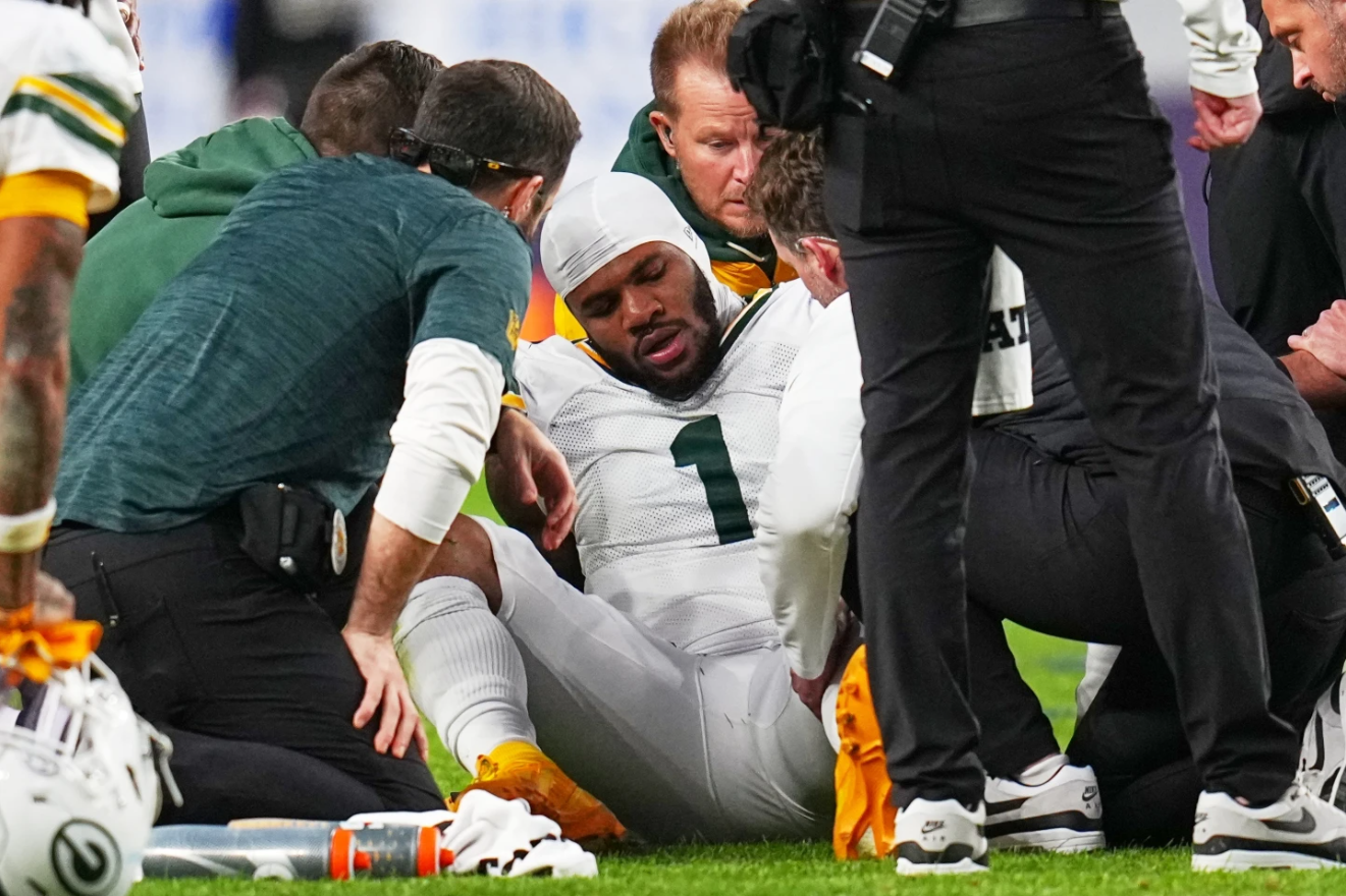 Green Bay Packers' Micah Parsons reacts after an injury during the second half of an NFL football game against the Denver Broncos Sunday, Dec. 14, 2025, in Denver, Co.