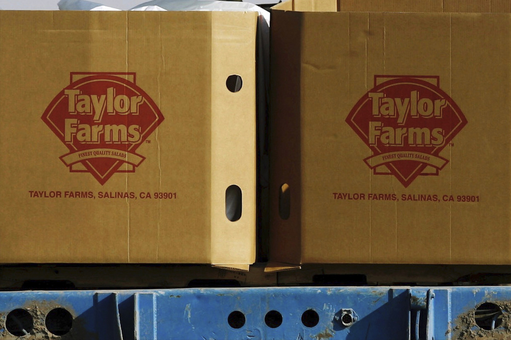 FILE - Taylor Farms boxes are loaded on a field in the town of Doctor Mora, on the central state of Guanajuato, Mexico, March 26, 2008.