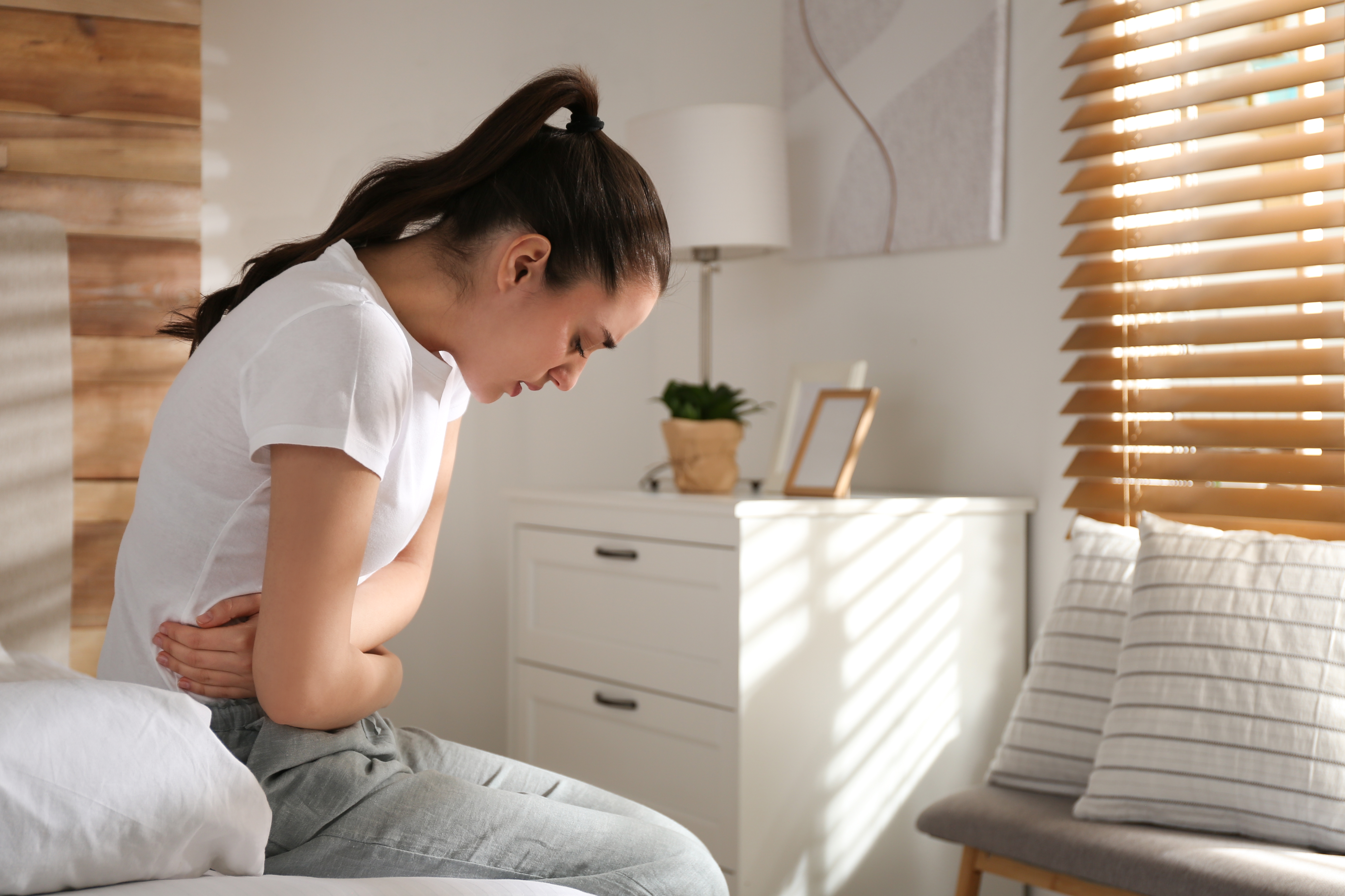 Woman suffering from a stomach bug.