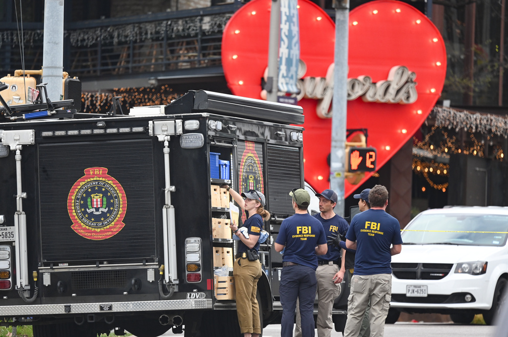The Austin Police Department and the FBI investigate a shooting at Buford's on 6th Street on Sunday, March 1, 2026, in Austin, Texas.