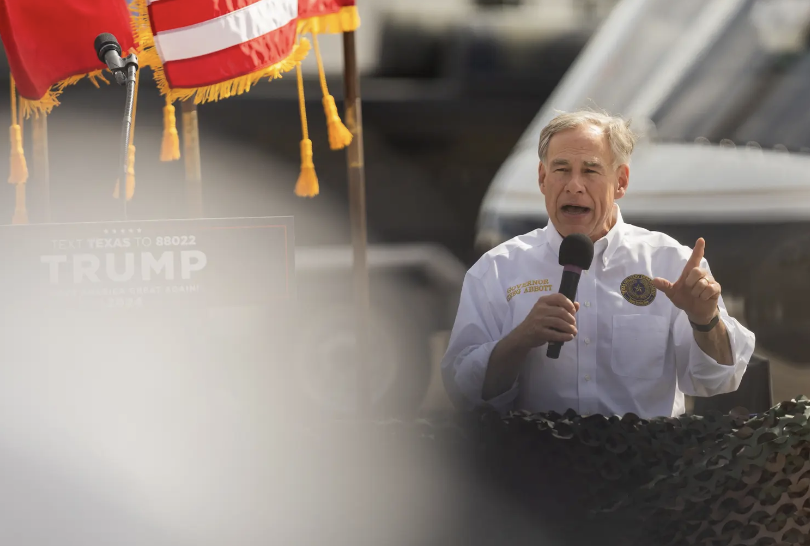 Gov. Greg Abbott jumps out of plane with 106-year-old World War II vet
