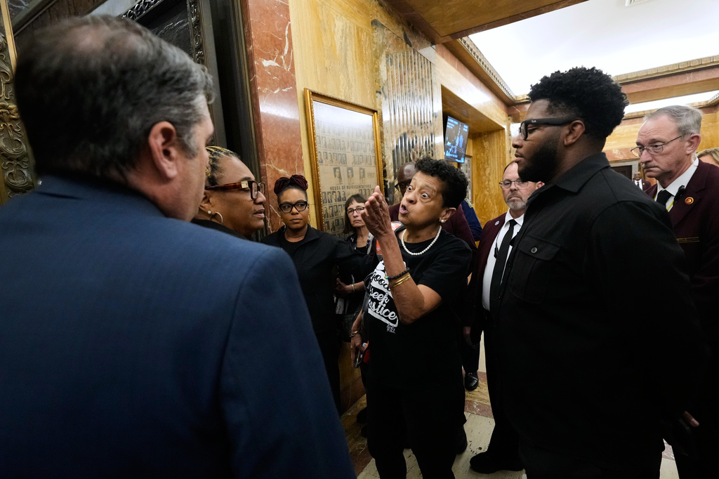 A person opposed to the redistricting plan reacts as she leaves the Louisiana House chambers after the plan to eliminate a majority-Black congressional district, in response to a U.S. Supreme Court ruling, was passed in Baton Rouge, La., Thursday, May 28, 2026. 