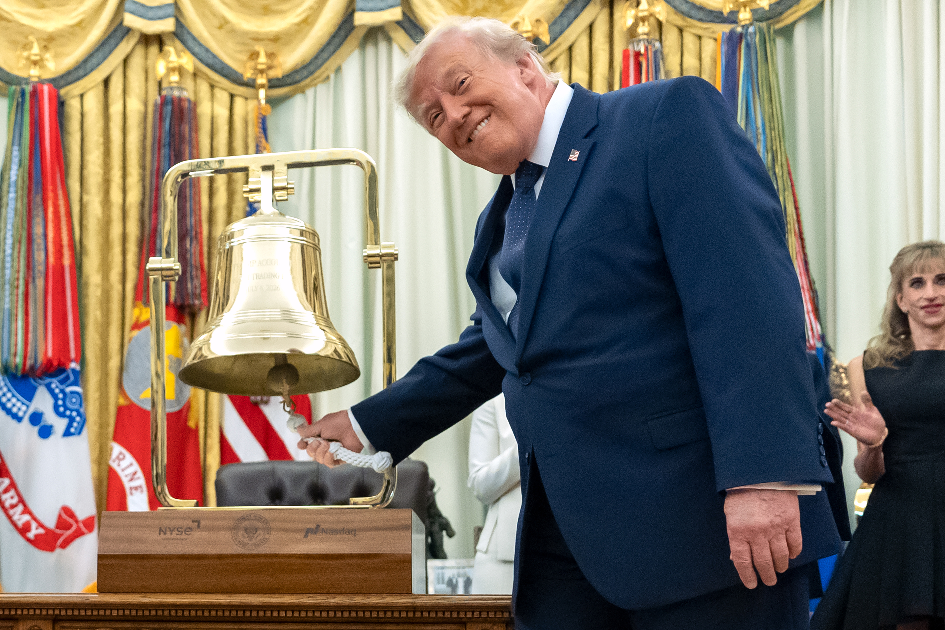 President Donald Trump rings the opening bell for the New York Stock Exchange and the Nasdaq in the Oval Office at the White House, Monday, July 6, 2026, in Washington. 