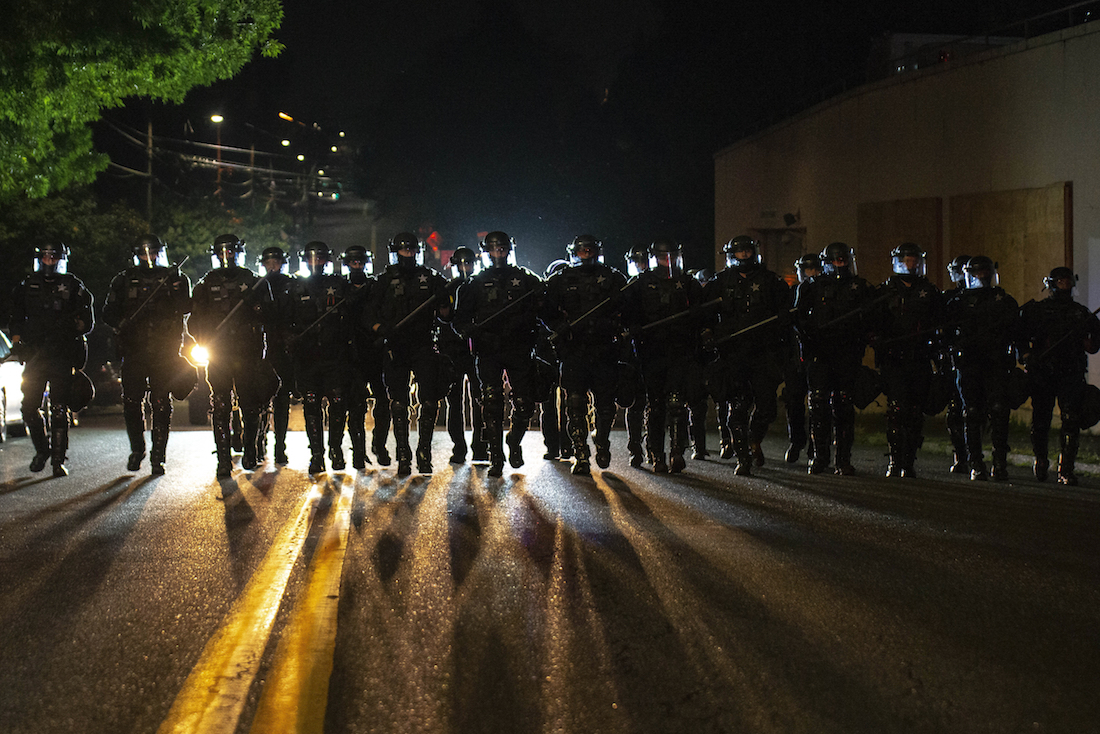 Portland police declare riot, use smoke to clear crowd