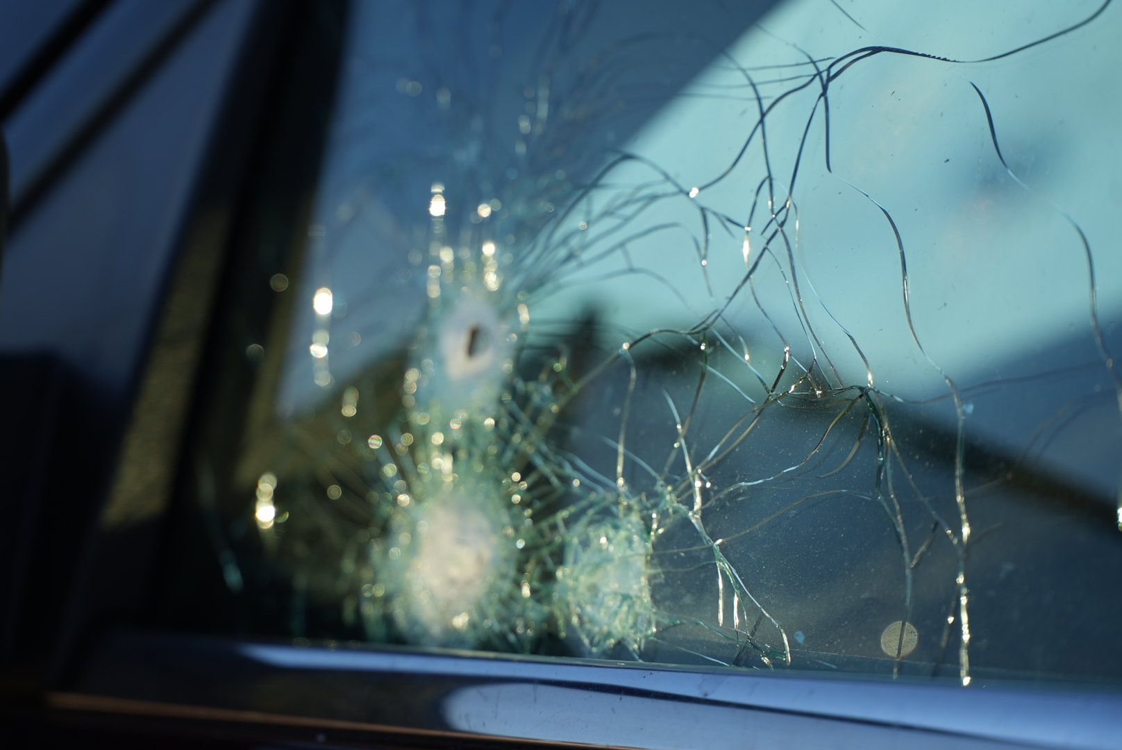 Bulletholes in windshield.jpg