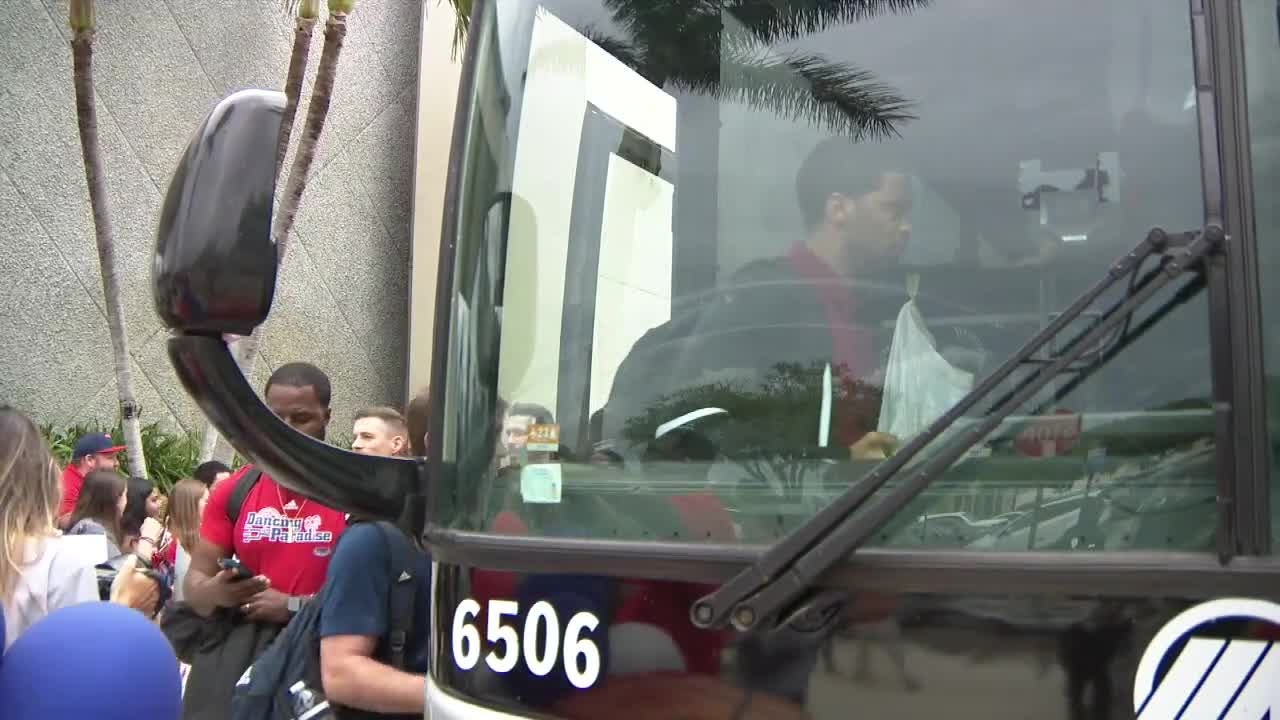FAU Owls men's basketball team boards bus before heading to NCAA tournament, March 15, 2023