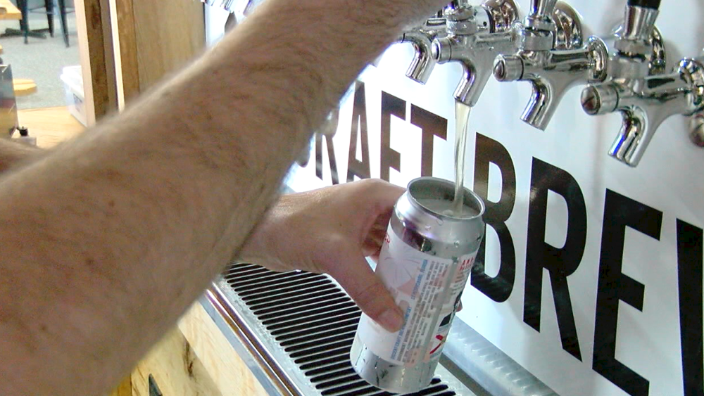 beer poured into can