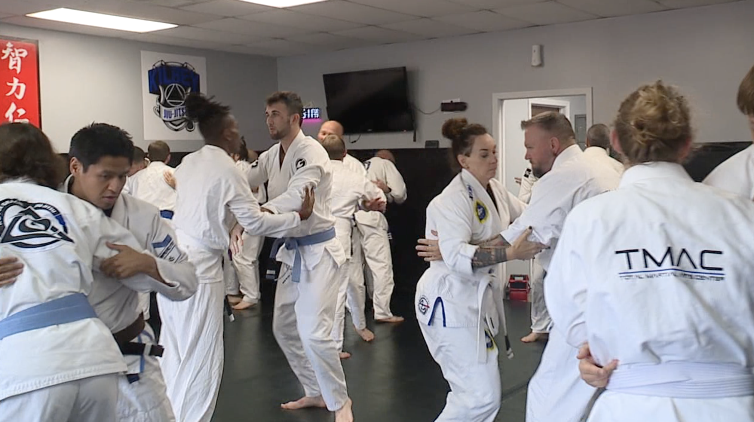 Law enforcement members practice martial arts in Olathe