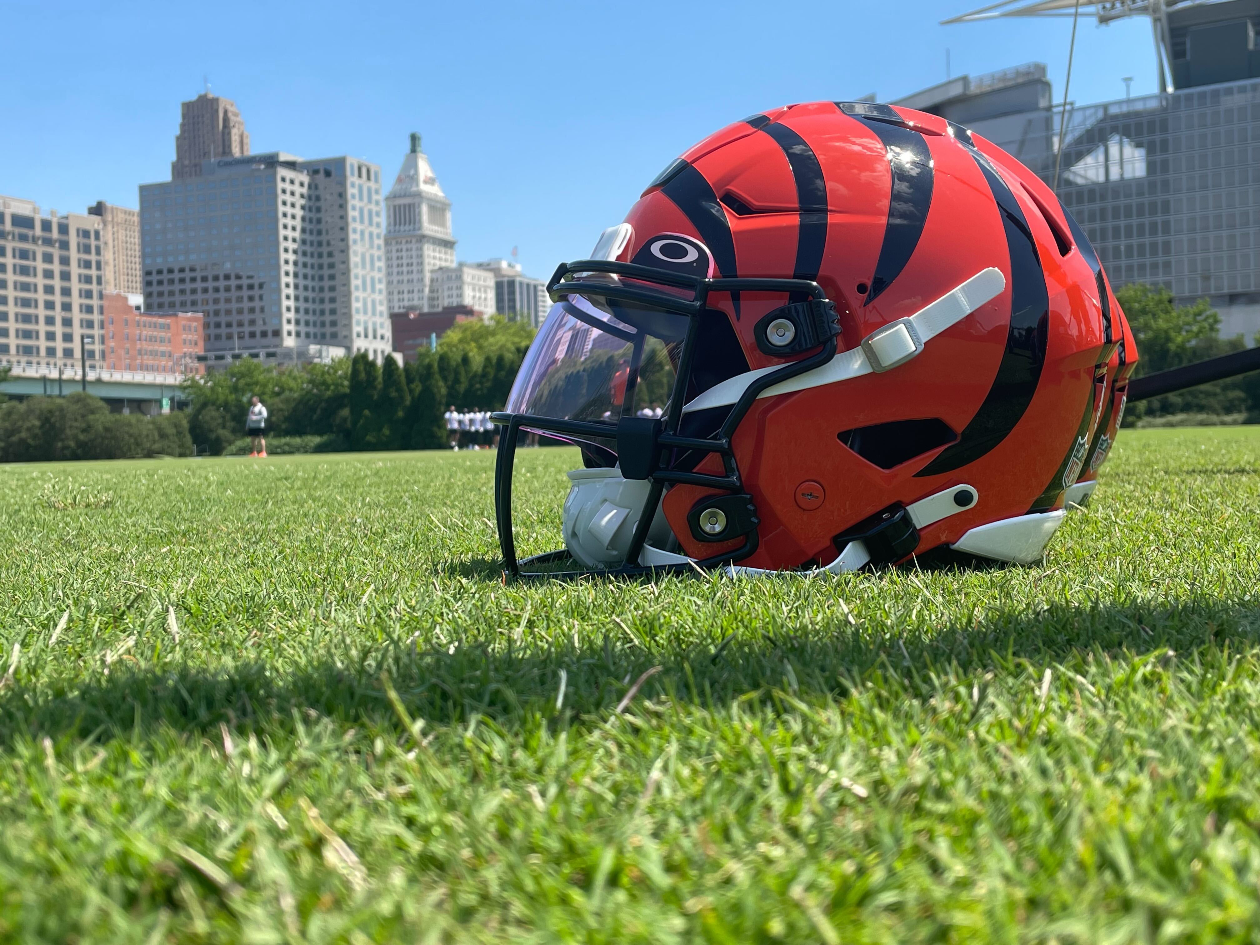 Cincinnati Bengals helmet against the city skyline