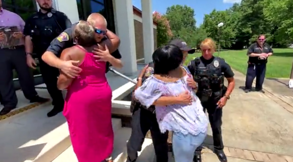 Prince George officers who rescued man from burning car honored by family