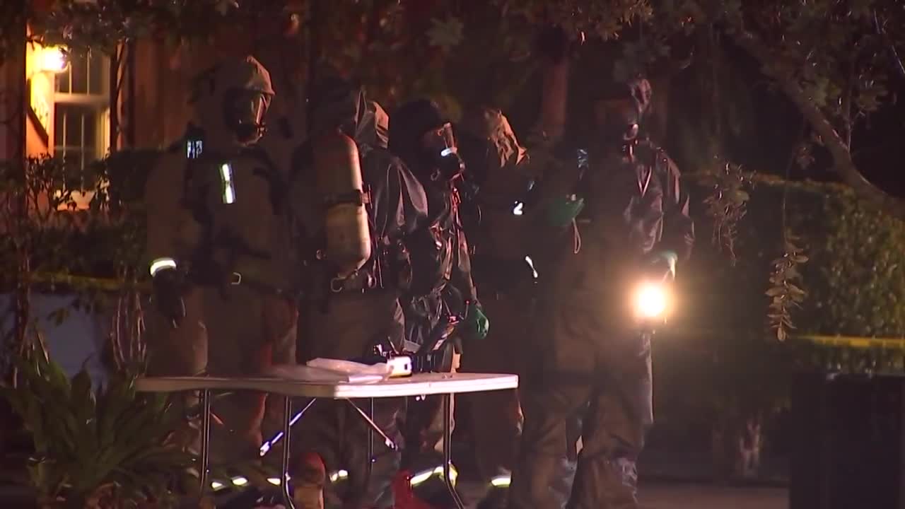 firefighters in hazmat gear at Wilton Manors home where US Military Academy cadets overdosed, March 10, 2022