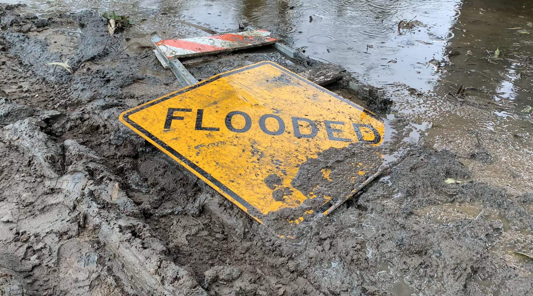 flooded road sign closures