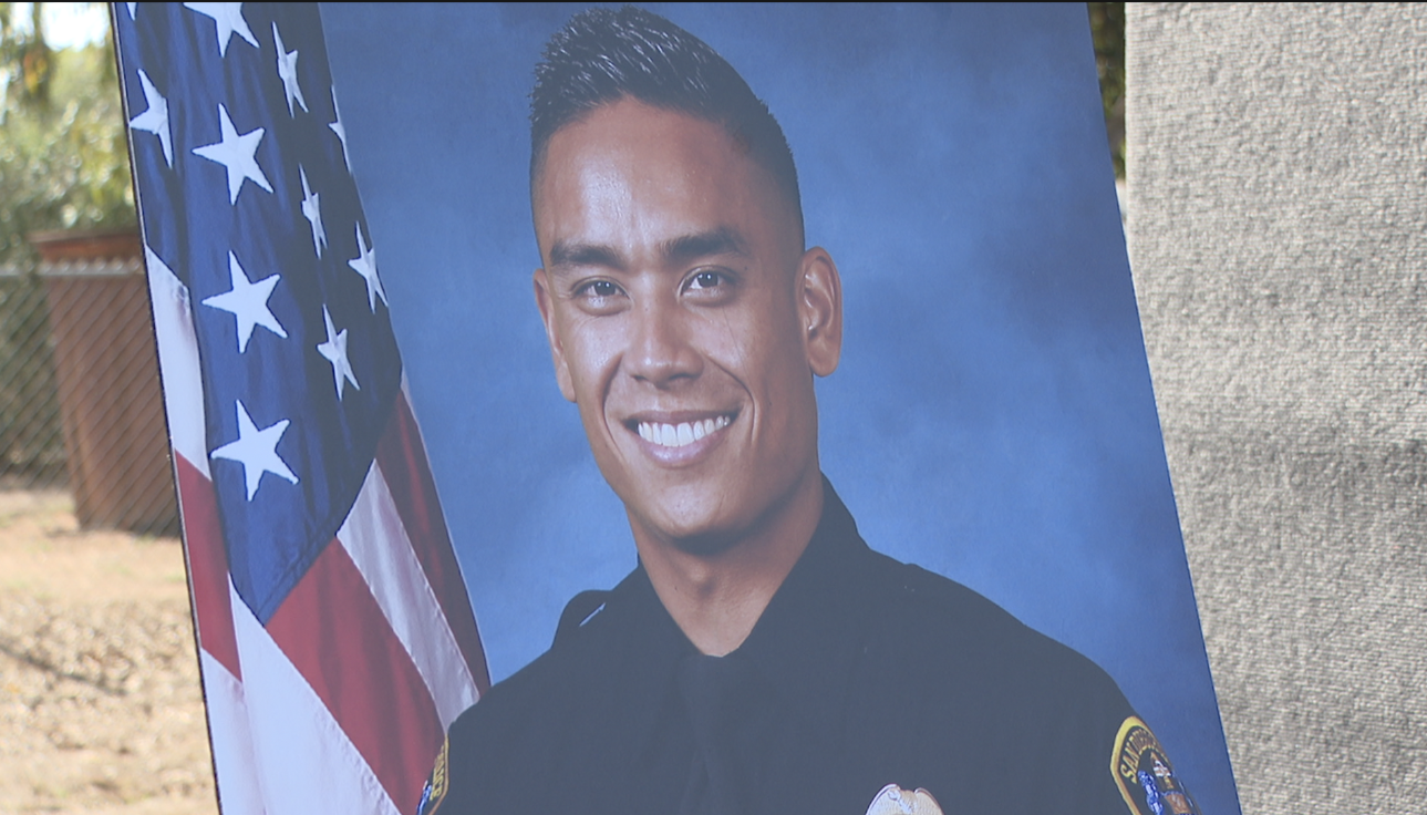 Community members honored Officer Austin Machitar Sunday morning at North Clairemont Community Park, which is now named after the fallen officer. 