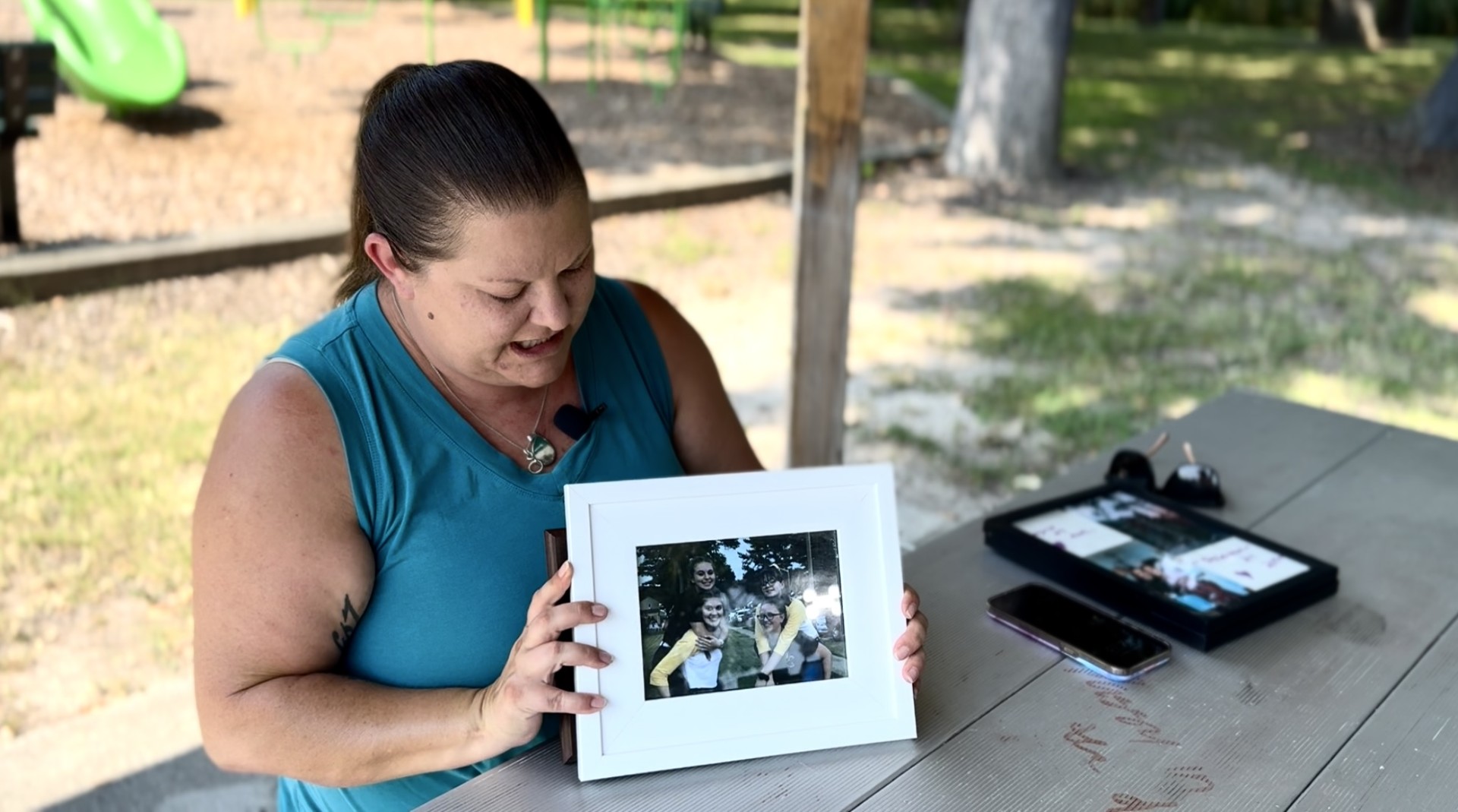 shannon doyle with pictures of daughter makayla cox.jpg
