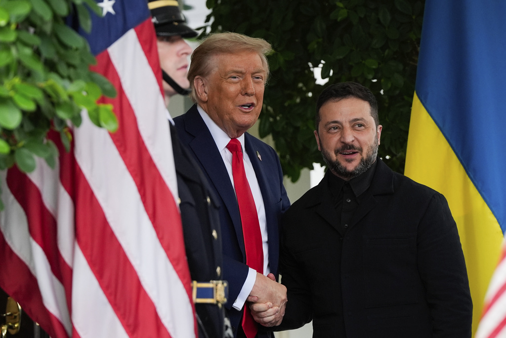 President Donald Trump greets Ukraine's President Volodymyr Zelenskyy at the White House, Monday, Aug. 18, 2025, in Washington.