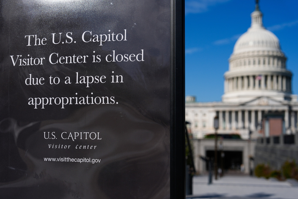 A sign announces that the U.S. Capitol Visitor Center is closed, on the first day of a partial government shutdown, Wednesday, Oct. 1, 2025, in Washington.