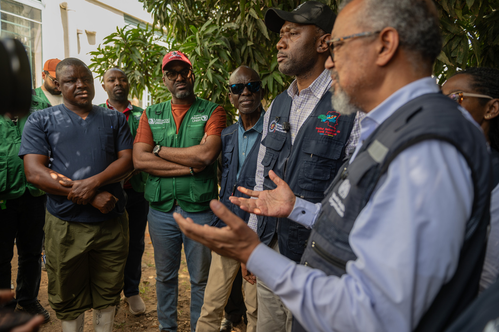 Director General of the World Health Organisation (WHO), Tedros Adhanom Ghebreyesus, meets with health workers who recovered from Ebola in Bunia, Congo, Sunday, May 31, 2026. 