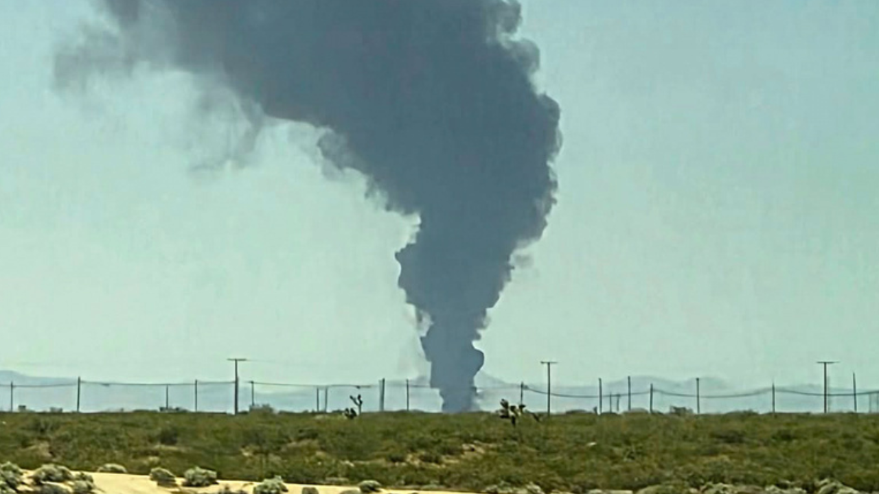 Smoke plumes rise from a B-52 bomber that crashed shortly after takeoff at a U.S. Air Force base in Southern California, Monday, June 15, 2026. 