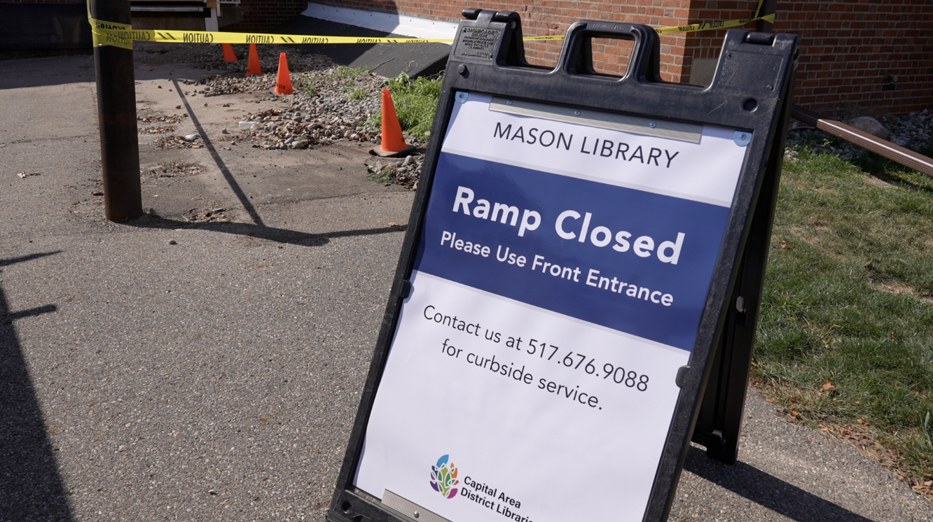 What's next after a vehicle collision at the Mason library?