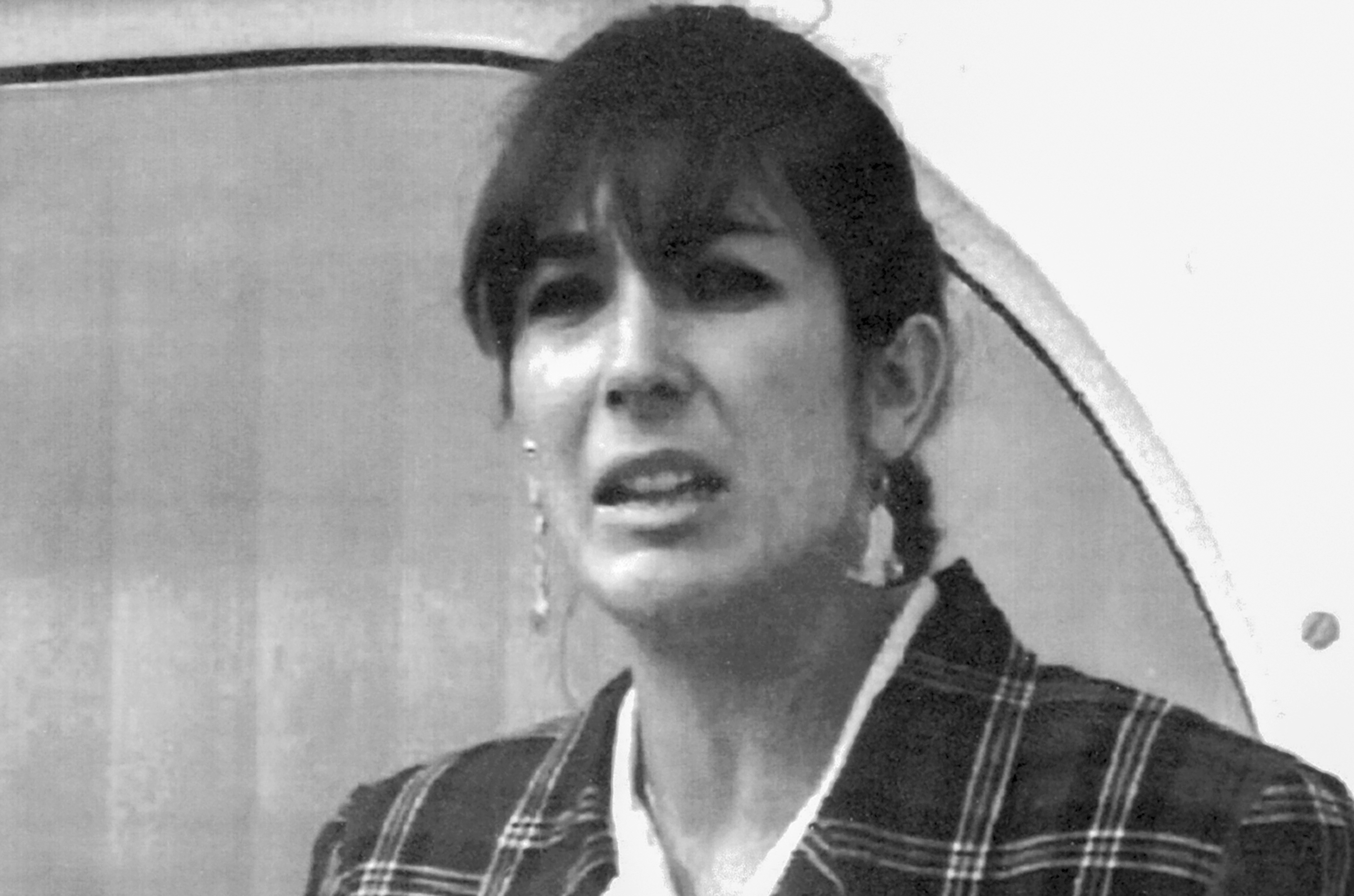 Ghislaine Maxwell, daughter of late British publisher Robert Maxwell, reads a statement expressing her family's gratitude to Spanish authorities after recovery of his body, Nov. 7, 1991, in Tenerife, Spain. 