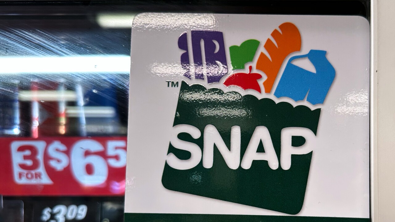 SNAP EBT information sign is displayed at a gas station.