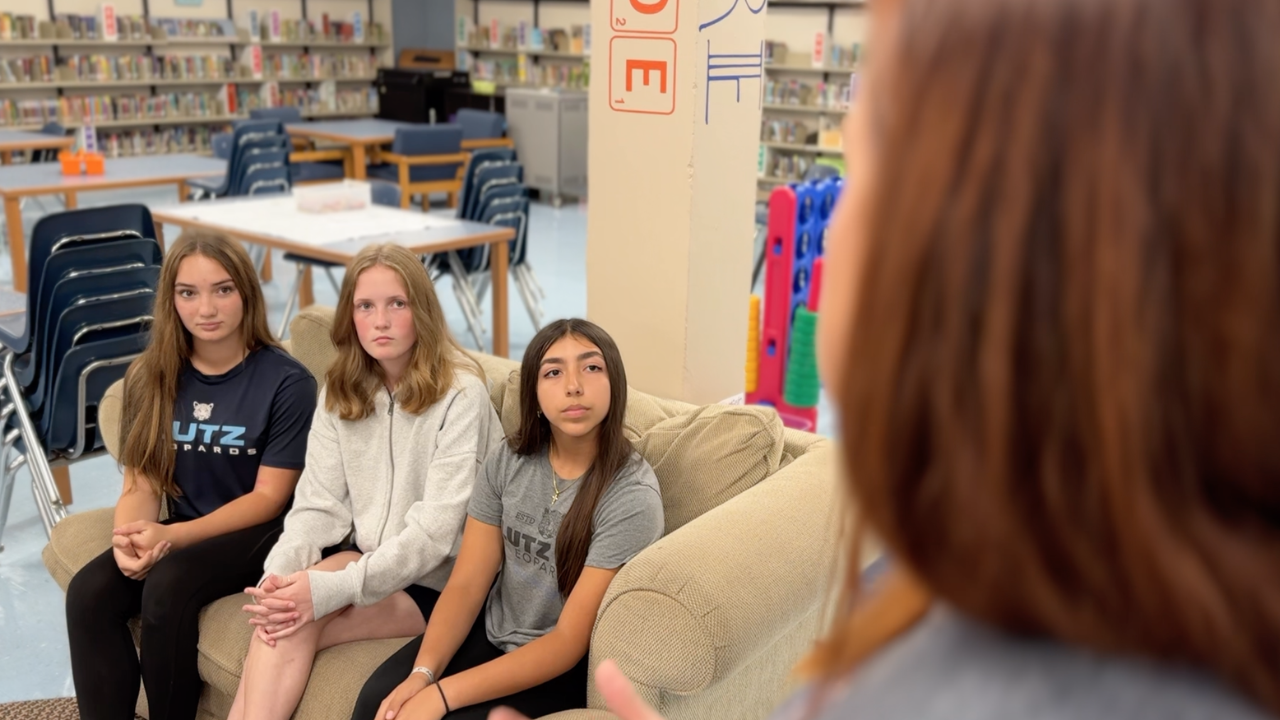 teacher with students.png