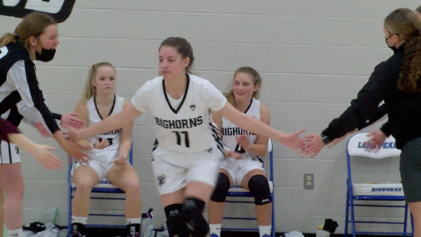 Lone Peak's Ivy Hicks dabs up her teammates