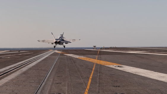 Jet taking off from aircraft carrier