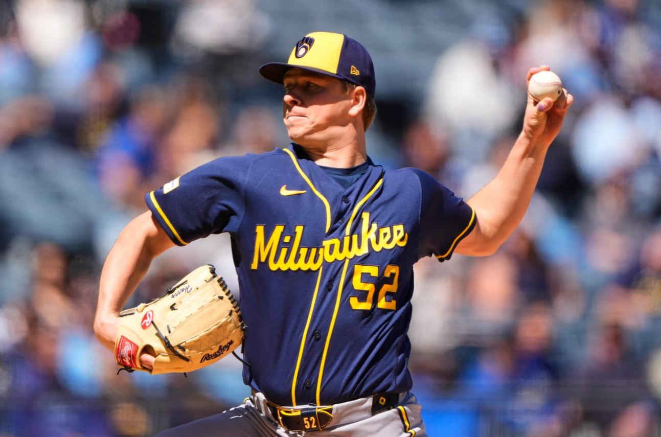 Milwaukee Brewers starting pitcher Kyle Harrison throws during the first inning of a baseball game against the Kansas City Royals, Sunday, April 5, 2026, in Kansas City, Mo.