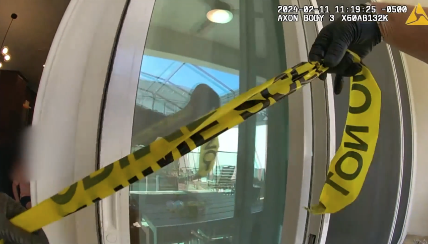 Crime scene tape at a vacation rental property.