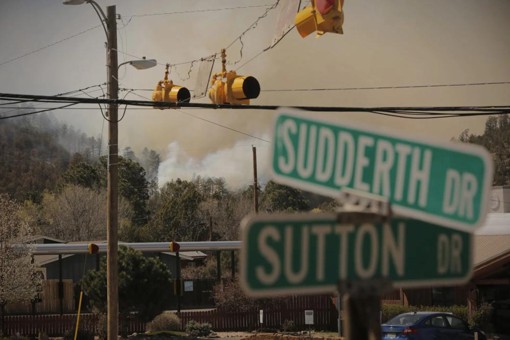 Gusty winds threaten to fan New Mexico fire that killed 2