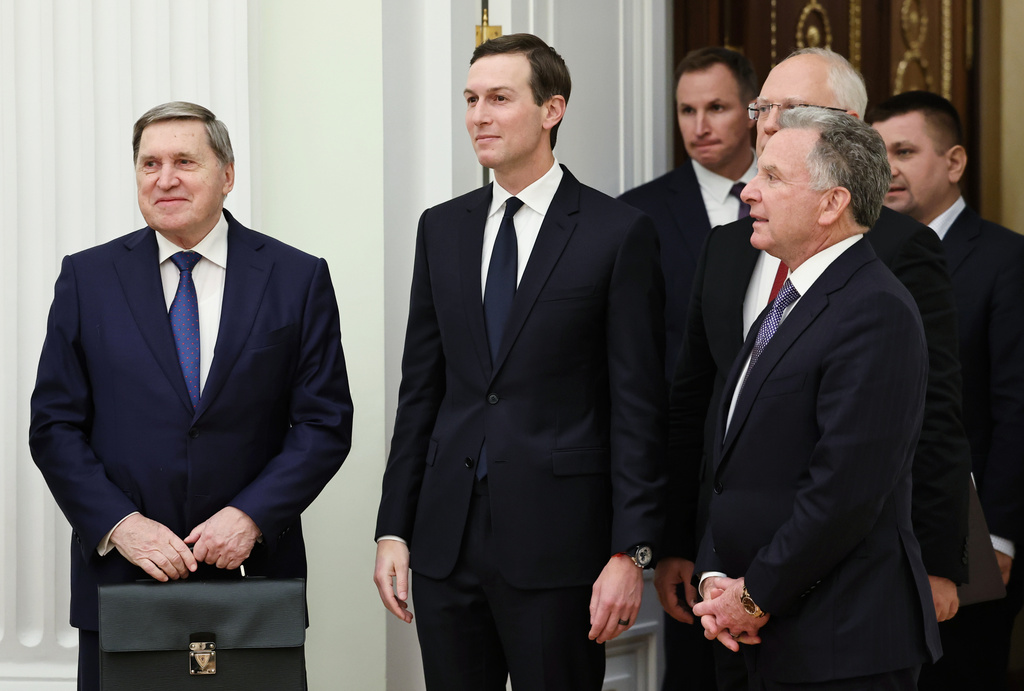 Russian Presidential foreign policy adviser Yuri Ushakov, left, U.S. President Donald Trump's son-in-law Jared Kushner, center, U.S. special envoy Steve Witkoff, foreground right, and Russian Direct Investment Fund CEO Special Presidential Representative for Investment and Economic Cooperation with Foreign Countries Kirill Dmitriev, behind Witkoff, arrive to attend talks with Russian President Vladimir Putin at the Senate Palace of the Kremlin in Moscow.