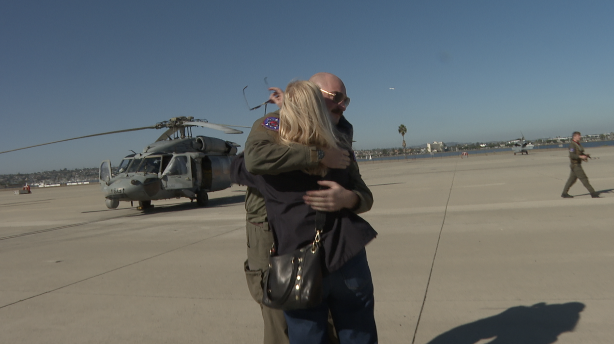 Chuck reuniting with his mom, Jane, on Saturday afternoon after a months-long deployment. 