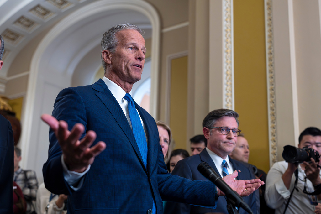 Senate Majority Leader John Thune, R-S.D., is joined by Speaker of the House Mike Johnson, R-La., right, as they speak with reporters.