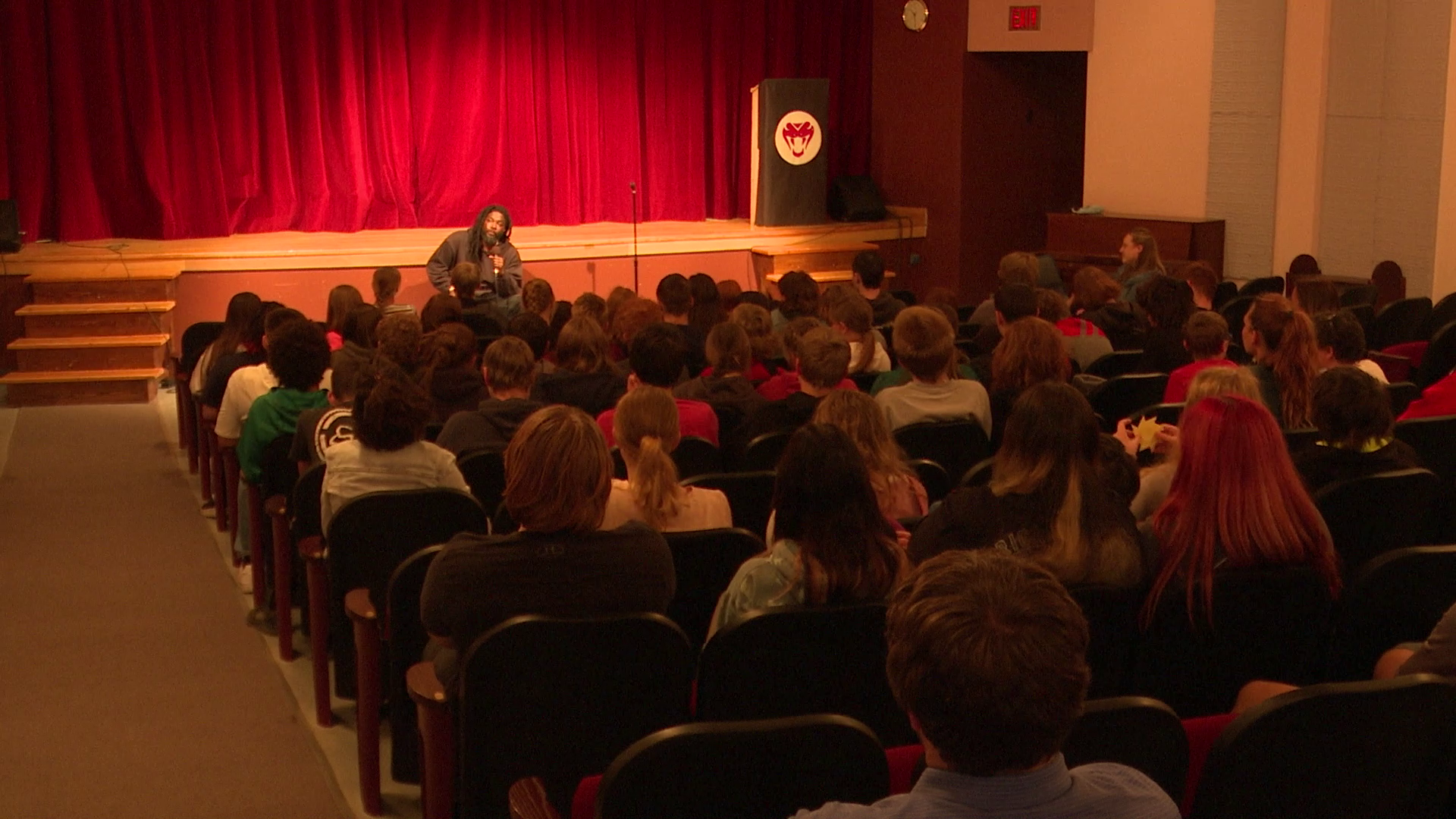  Jason Reynolds talks with student at Dutton-Brady School