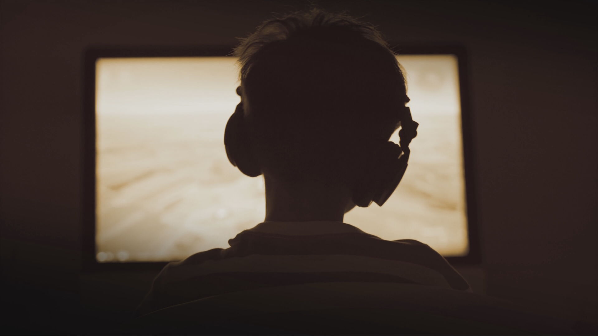 Child playing video game.jpeg