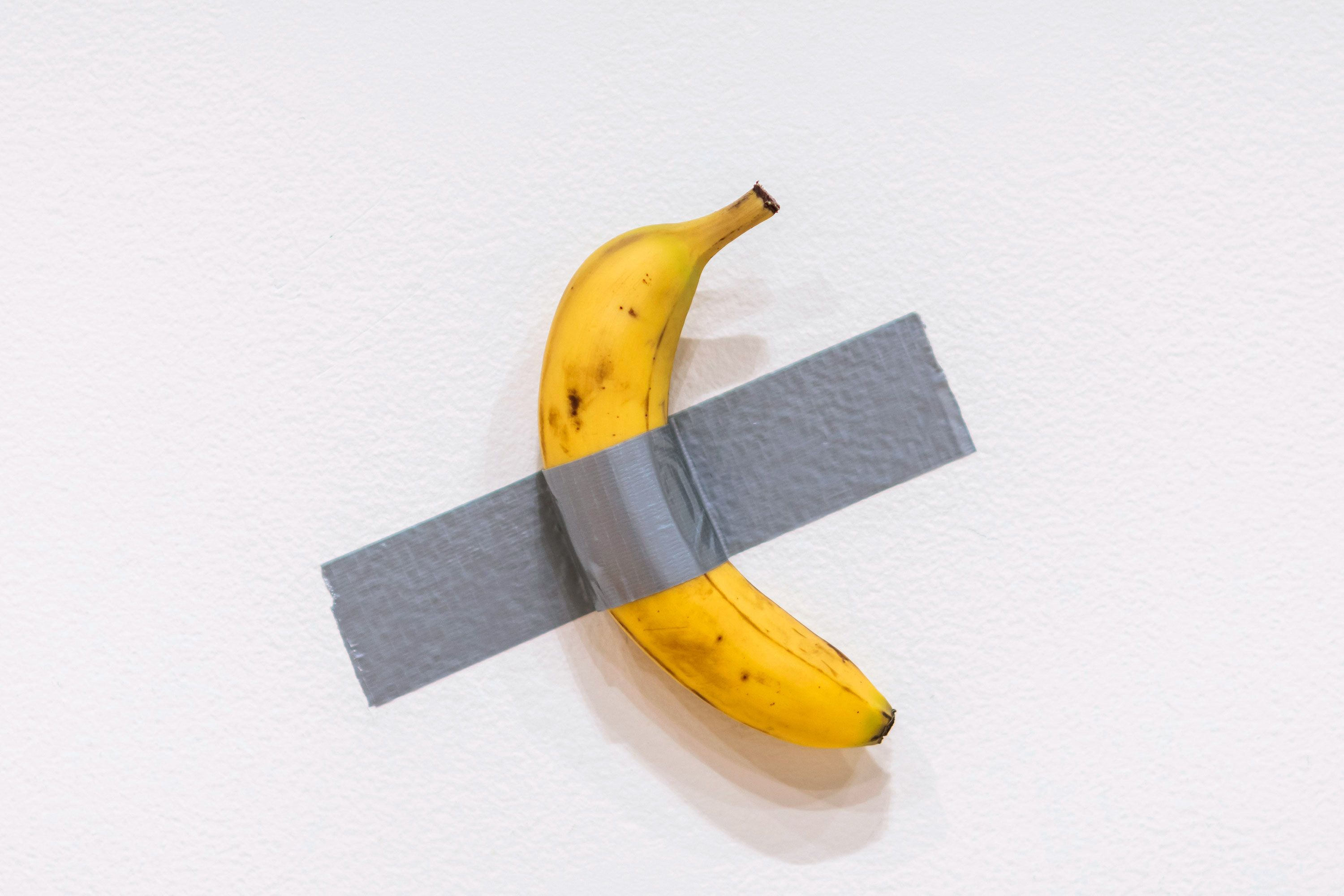 Banana duct taped to wall art