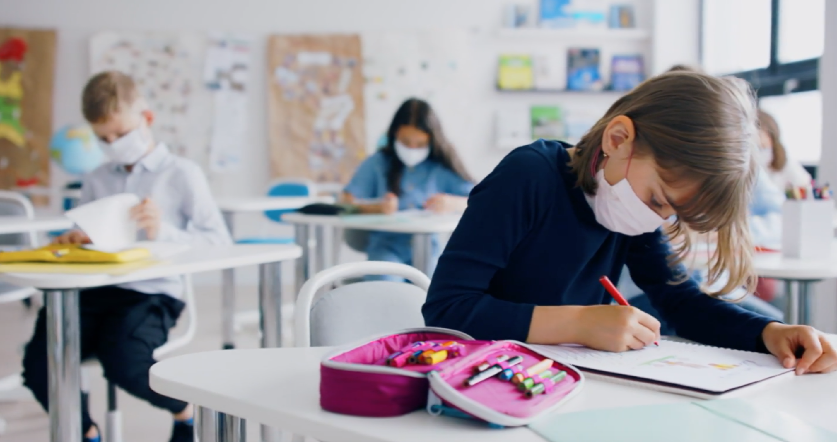 Kids with masks in school
