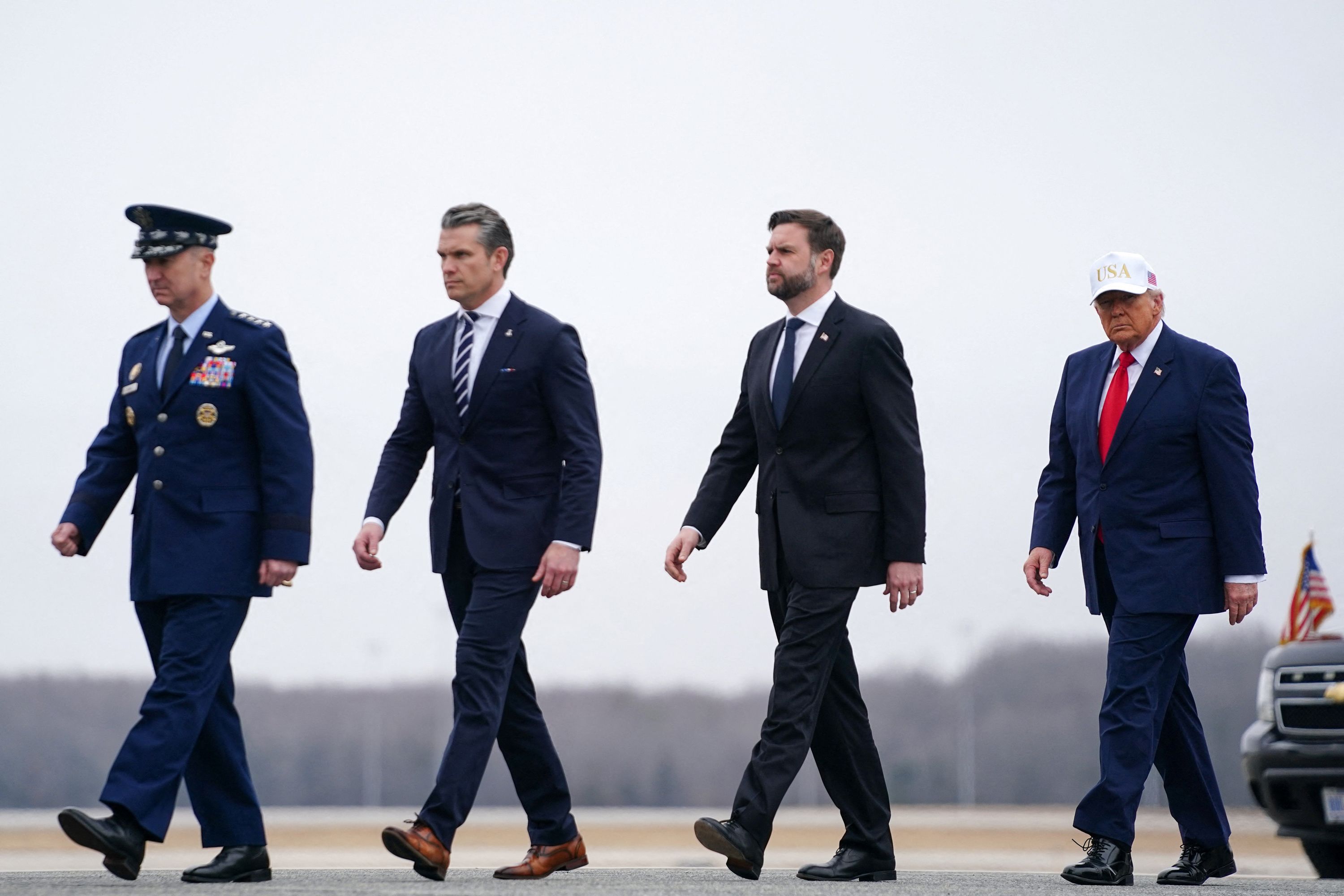 US President Donald Trump, Vice President JD Vance, Defense Secretary Pete Hegseth and Joint Chiefs of Staff Chairman General Dan Caine participate in a dignified transfer of the remains of six US Army service members of the 103rd Sustainment Command, who were killed in Kuwait, on March 7, 2026.