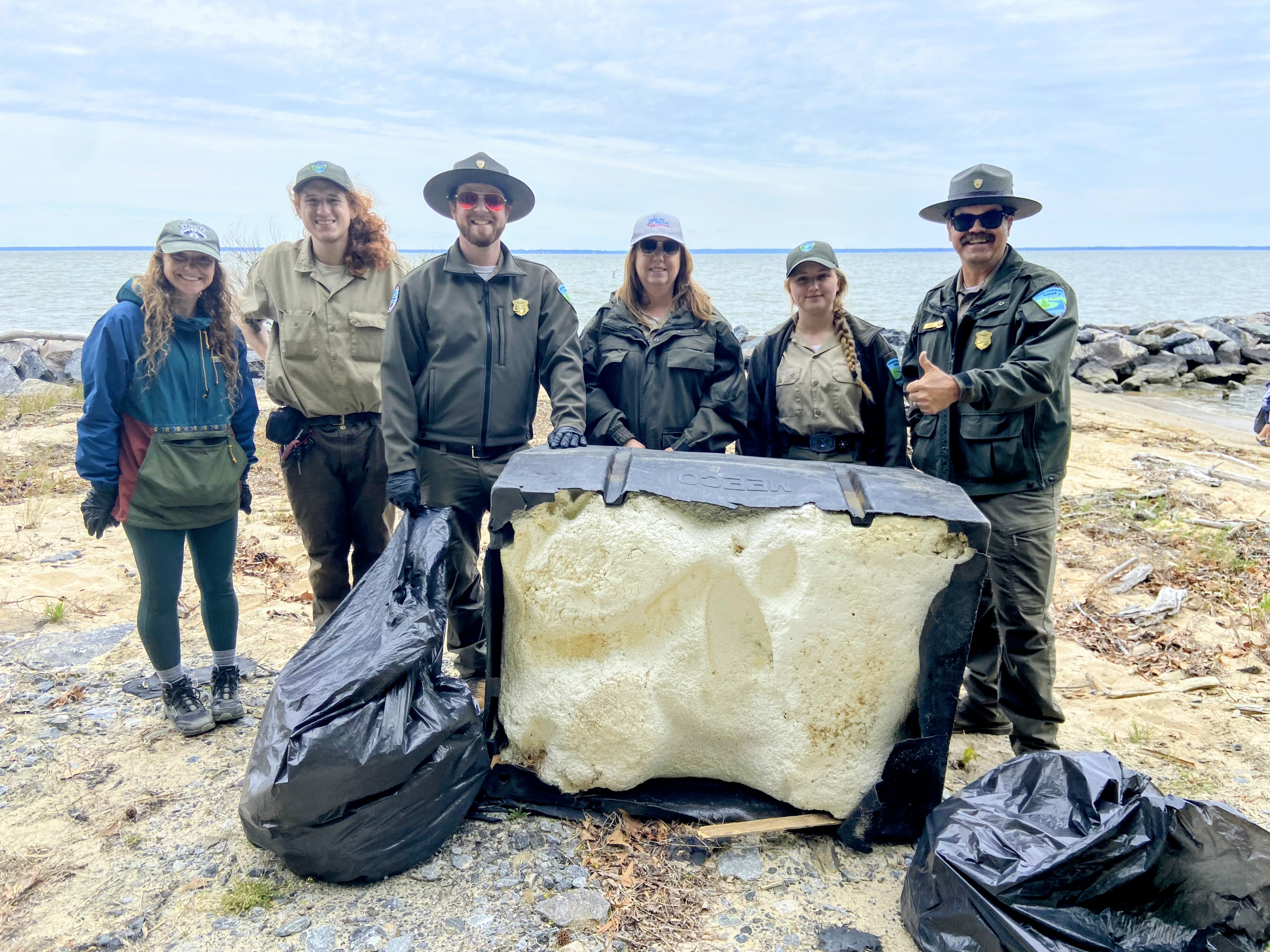 Staffers at Westmoreland State Park in Montross, Virginia, pose with a giant piece of debris.