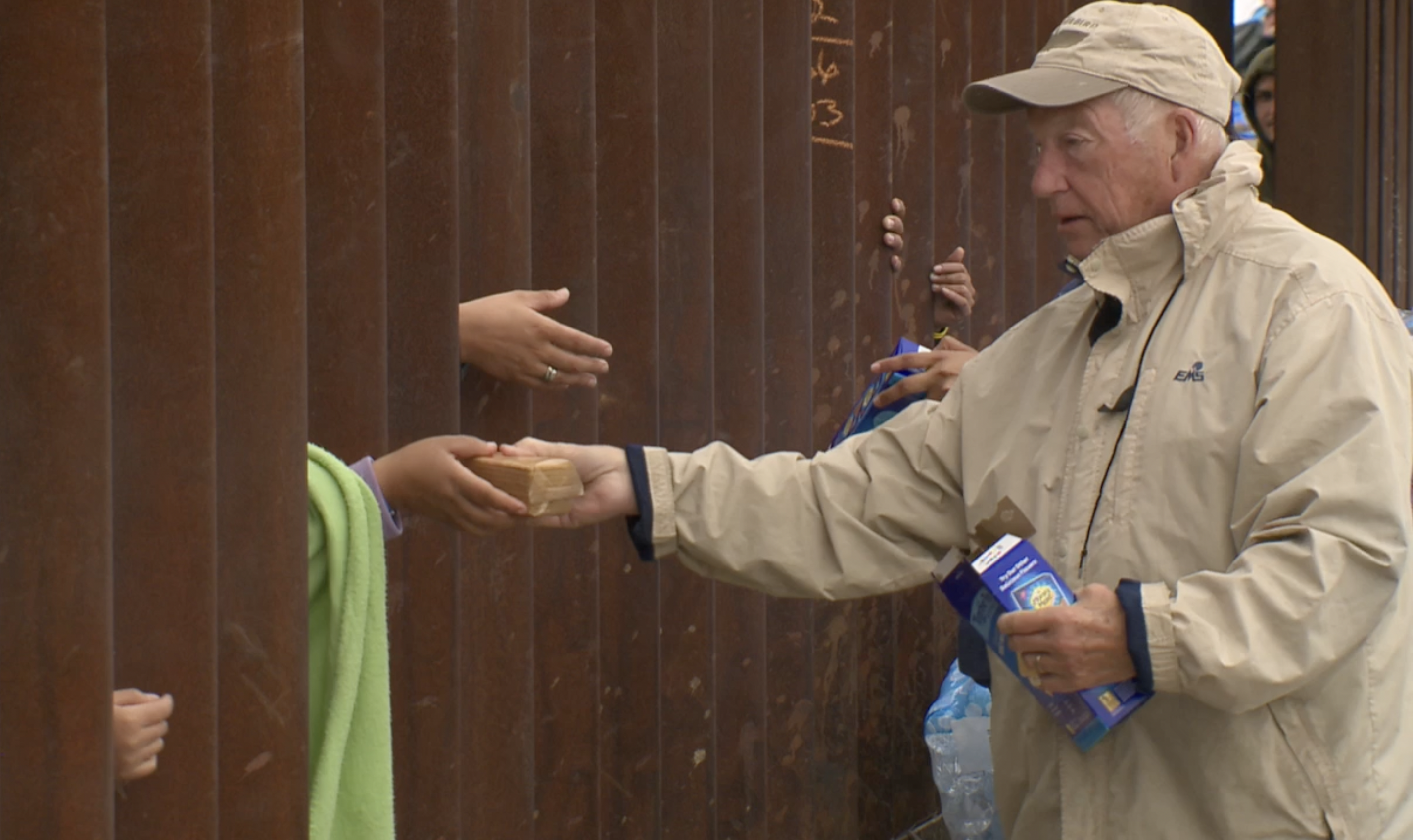 Dozens of volunteers still at the border, serving hundreds of migrants