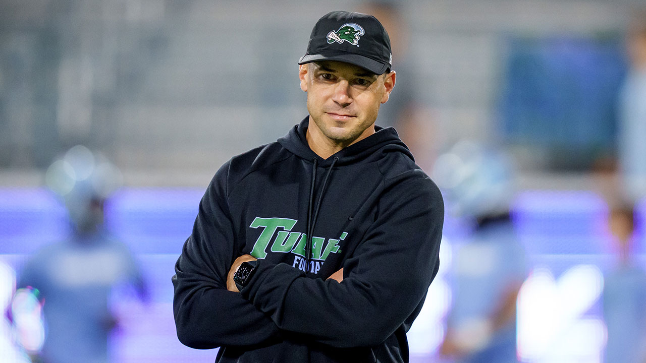 Tulane head coach Jon Sumrall watches his players before an NCAA college football game against Charlotte in New Orleans, Saturday, Nov. 29, 2025. (AP Photo/Matthew Hinton)
