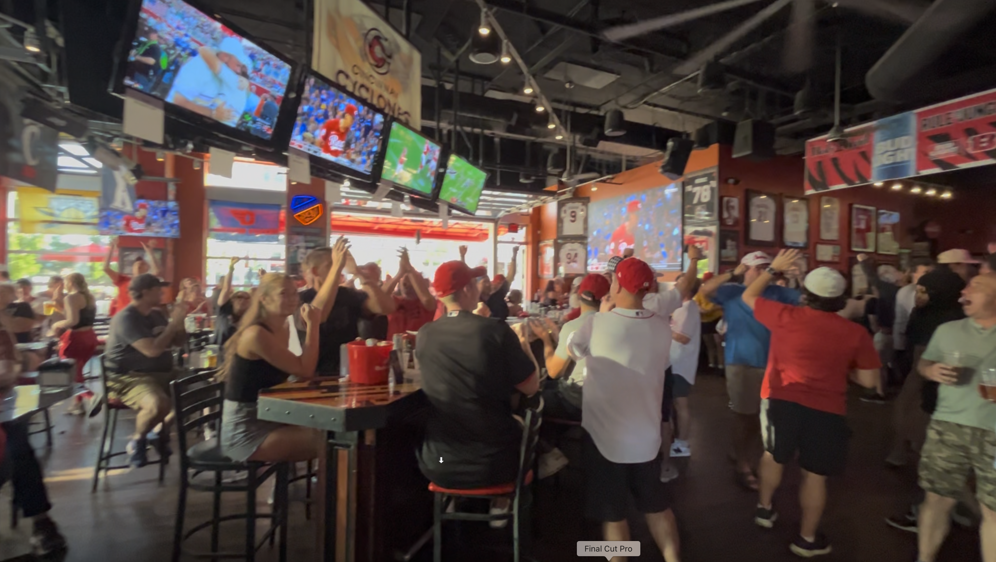 Fans cheering on both the Cincinnati Reds and the Miami Marlins
