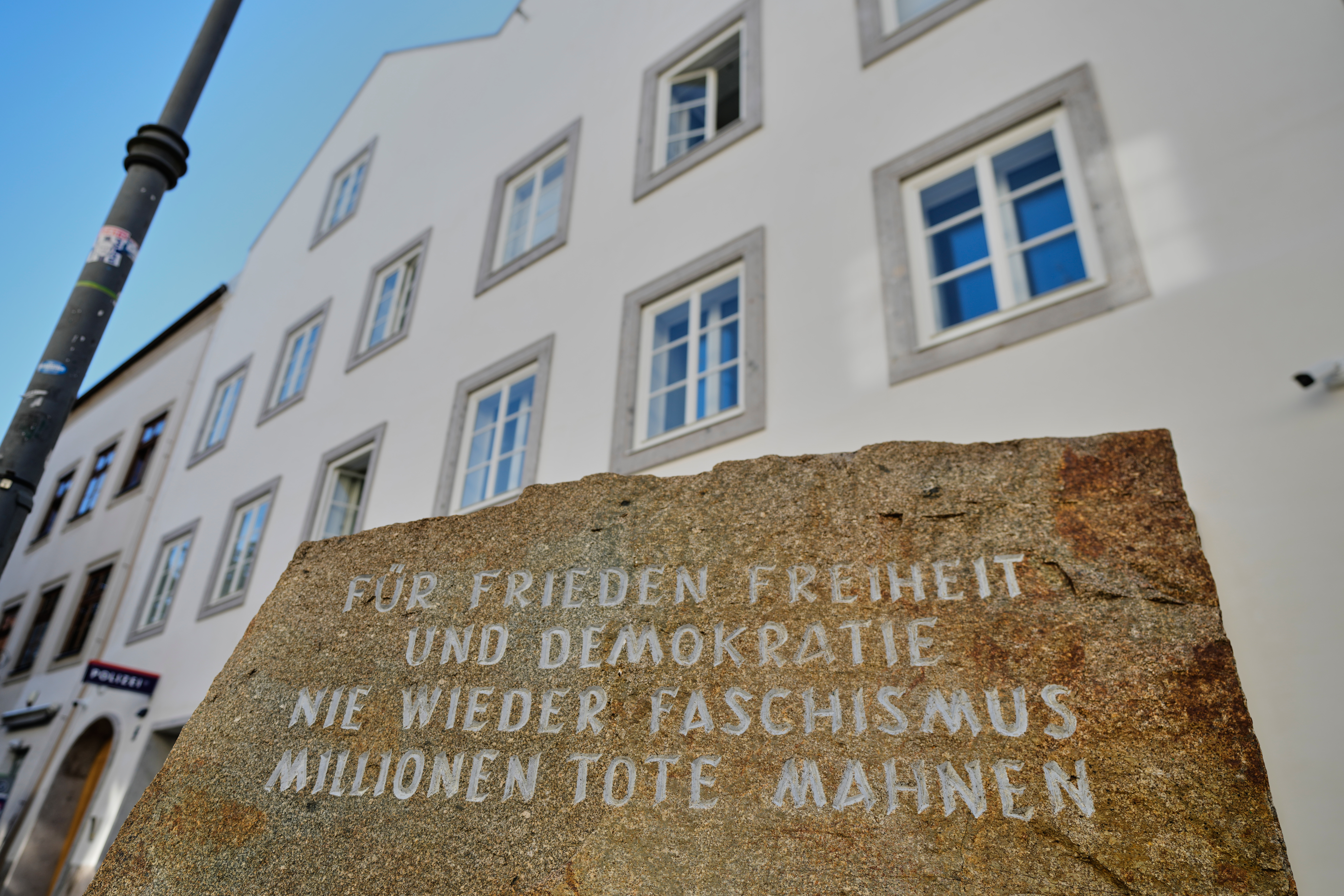 A new police station with a memorial stone reading "for peace, freedom and democracy, never again fascism, million dead remind" is located and will be officially opened in Adolf Hitler's birth house in Braunau am Inn, Austria, Wednesday, July 22, 2026. 